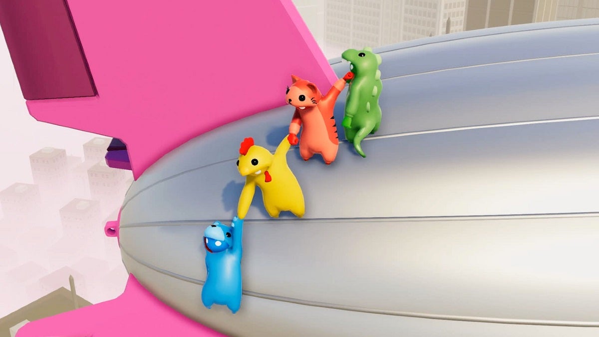 Gang Beasts characters holding each other.