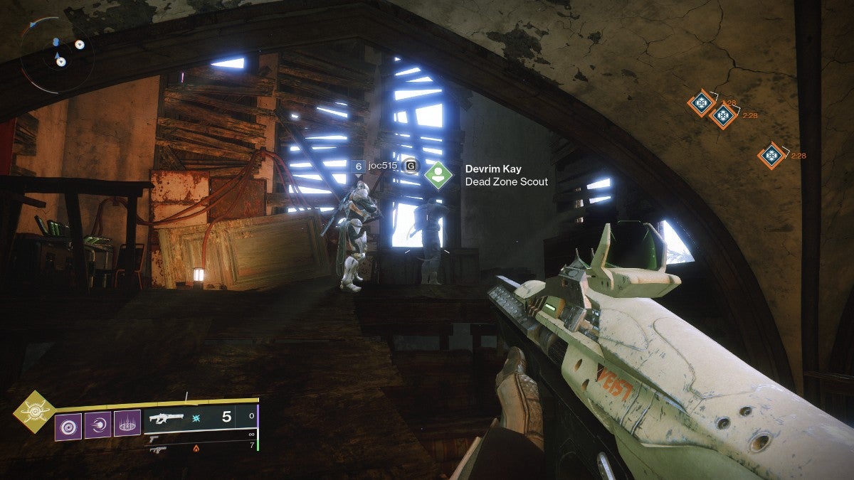 The player finding a sniper ally named Devrim Kay in the bell tower of a church.