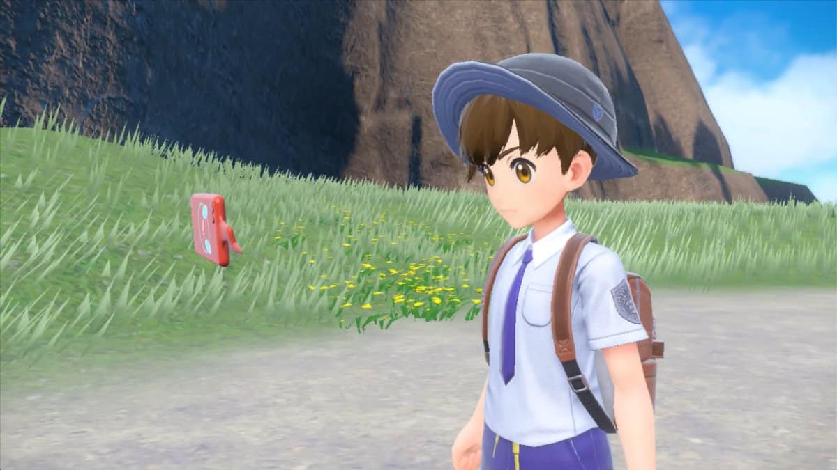 A player looking at a hovering Rotom Pokédex in the Pokémon Scarlet and Violet trailer.