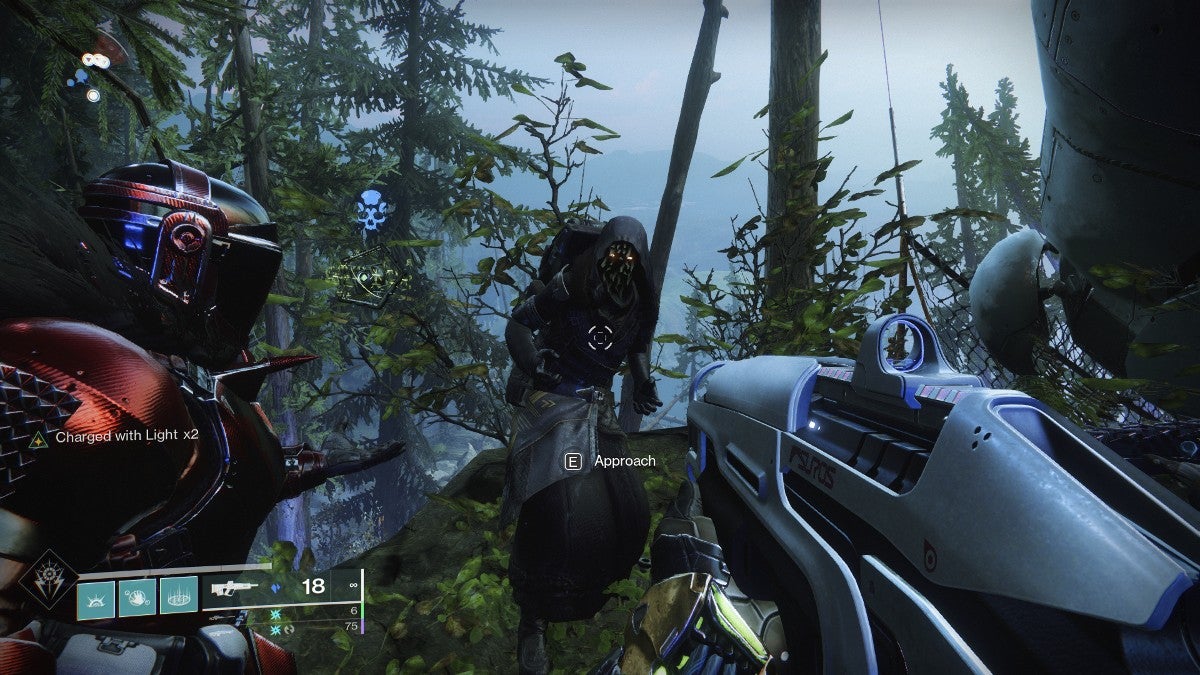 Xur standing near a ledge in a wooded area.