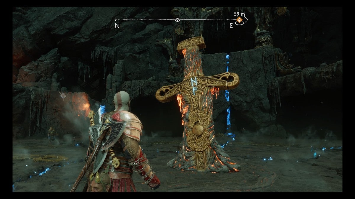 Kratos looking at the central Surtr sword with the NF runes on it.