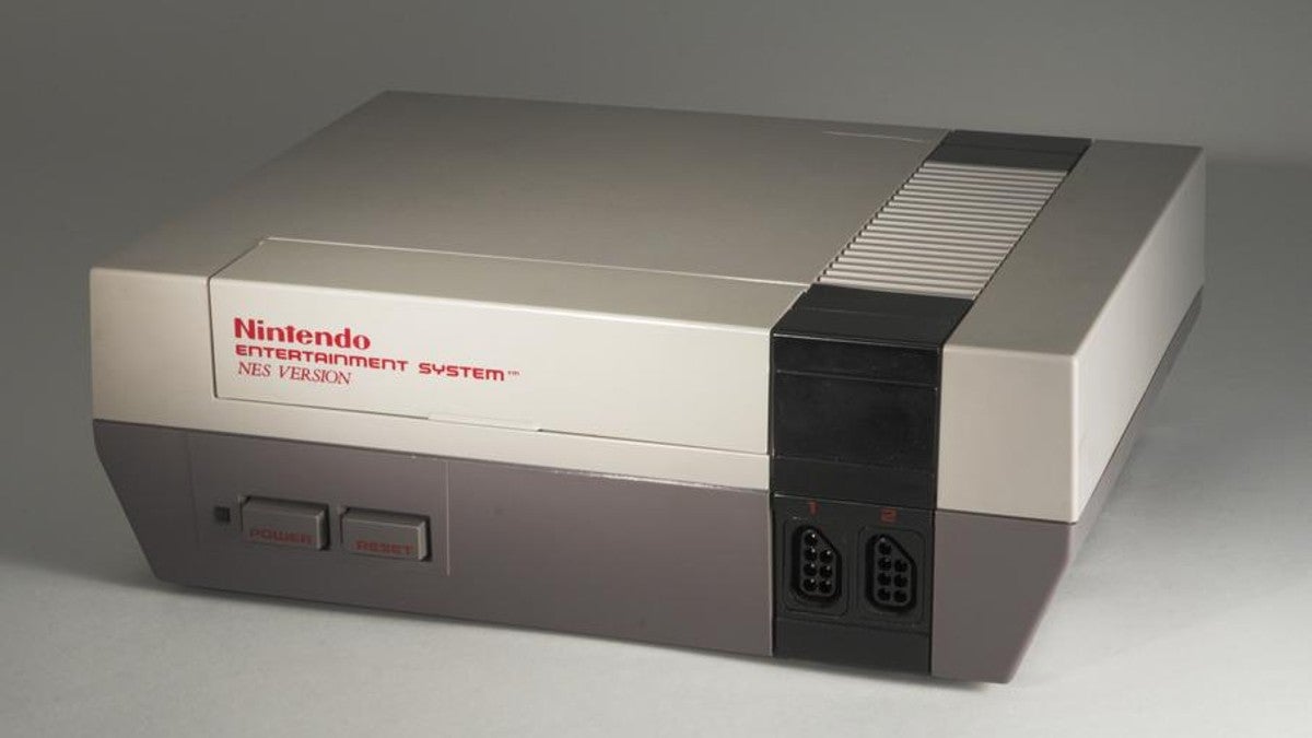 A Nintendo Entertainment System (NES) in front of a white background.