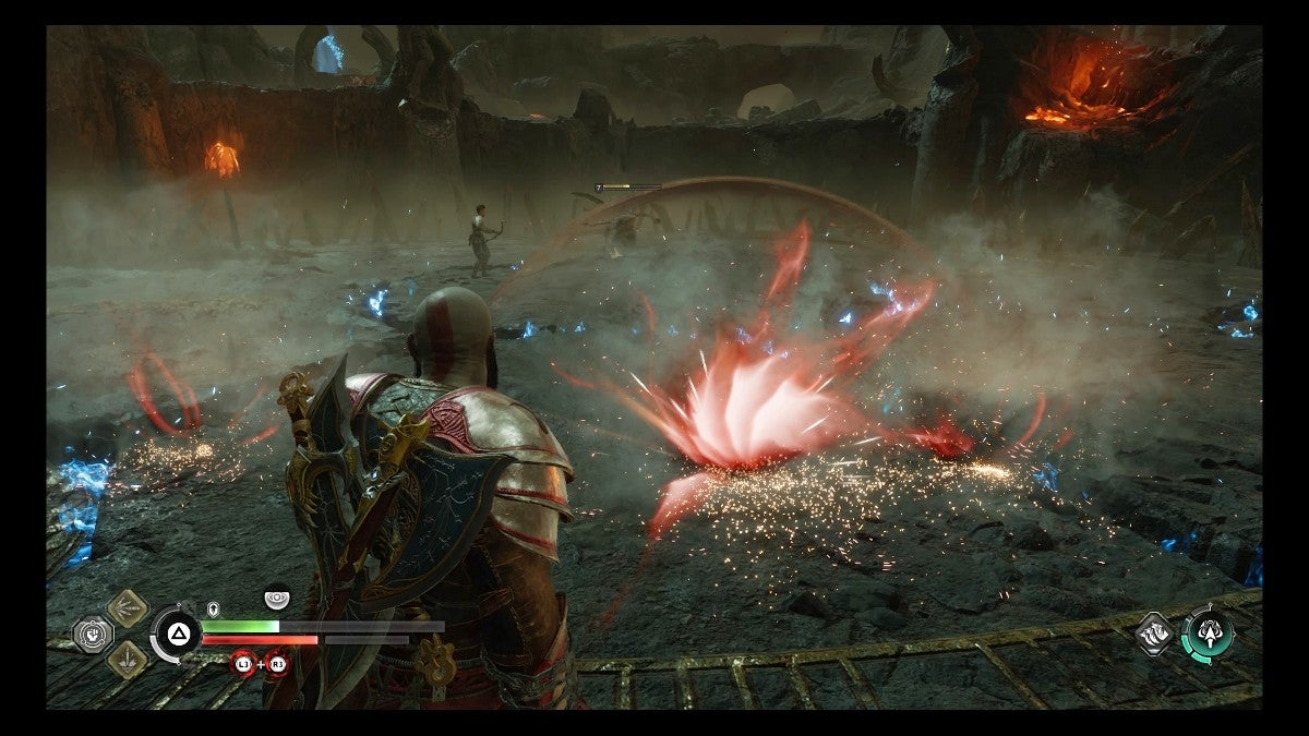 Kratos avoiding a Dark Elf Lord's attacks.