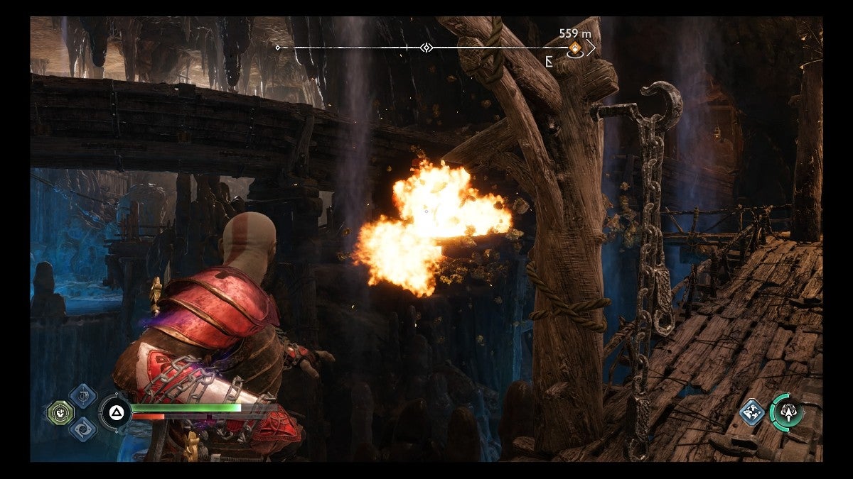 Kratos exploding a vase to clear away debris.