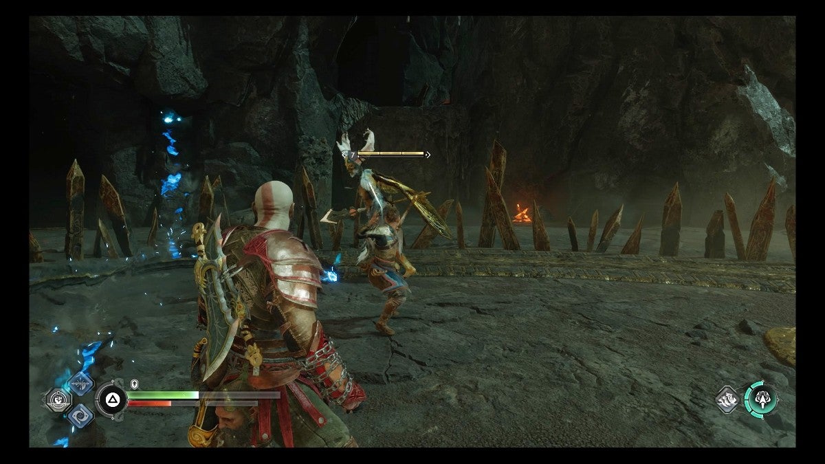 Kratos facing a Dark Elf Lord.