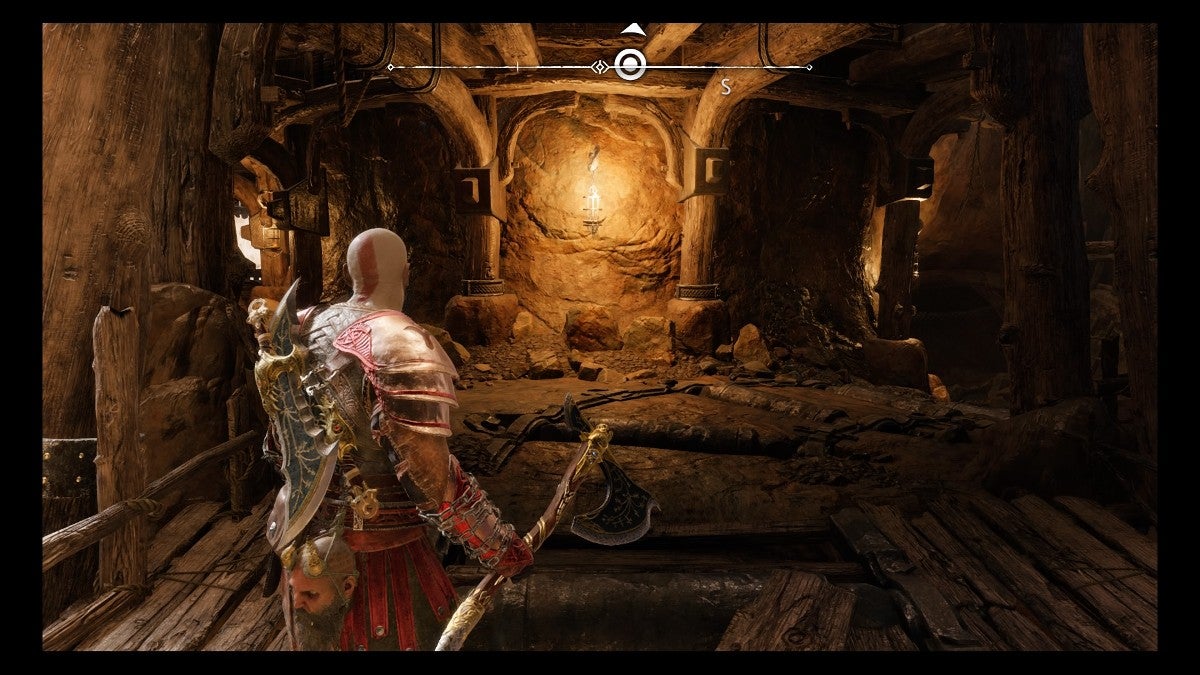 Kratos looking at a forked path.