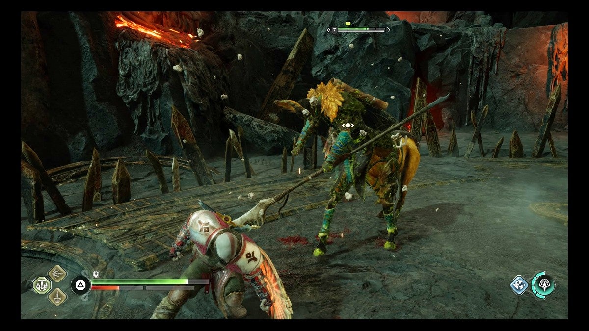 Kratos hitting a Stalker with the Guardian Shield's special attack.