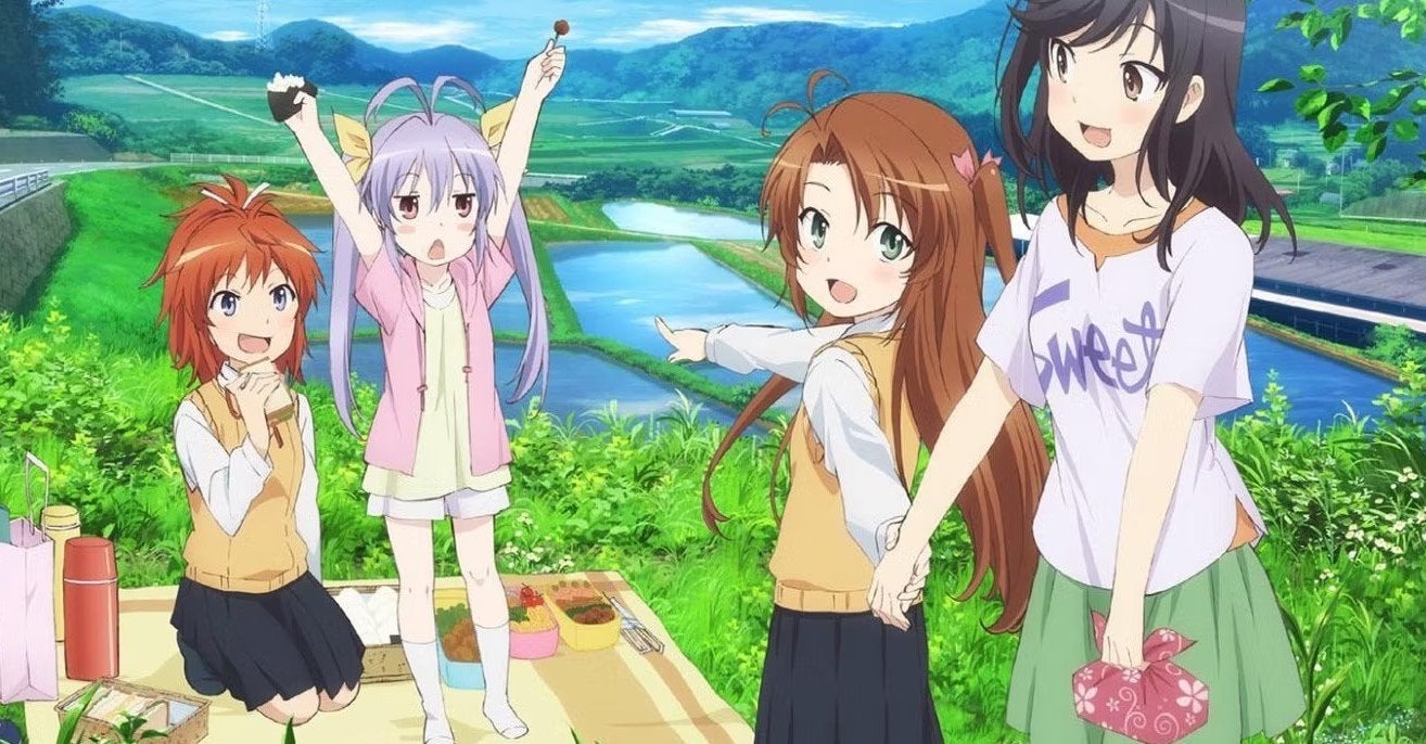 The characters from Non Non Biyori standing in front of the gorgeous Japanese countryside.