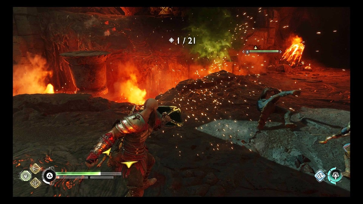 Kratos knocking an enemy back with a shield strike.