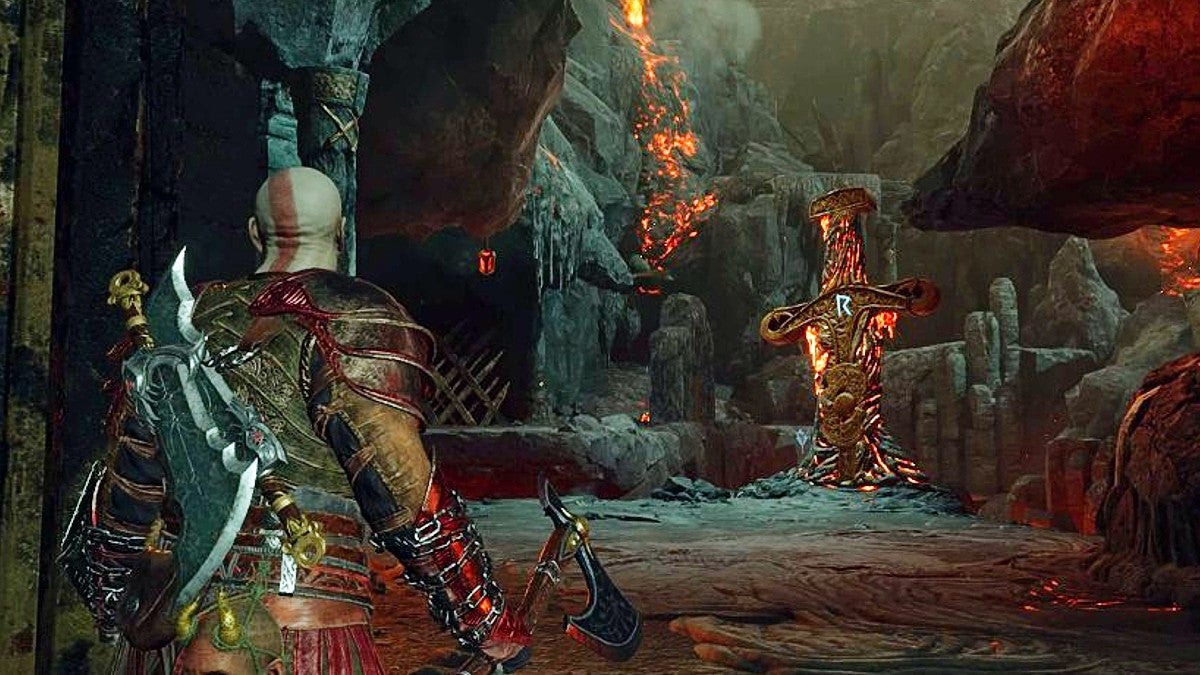 Kratos looking at a Surtr sword with an "R" rune on it.