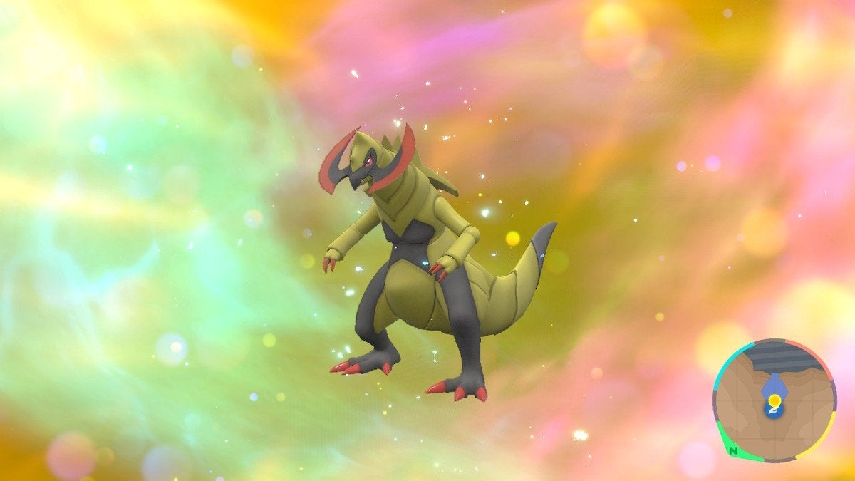 Haxorus standing in front of a rainbow background.