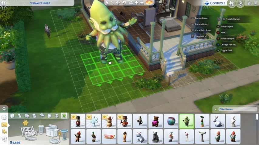 An oversized garden gnome statue in The Sims 4 Build and Buy mode.
