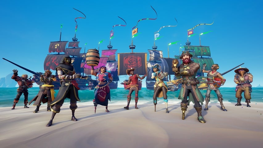 Pirates standing together on the shore with their ships in the background in Sea of Thieves.