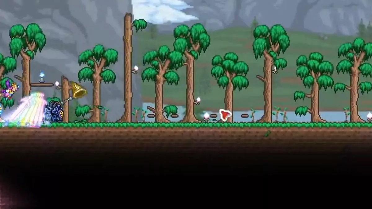 Catching bait using a Golden Bug Net in Terraria.