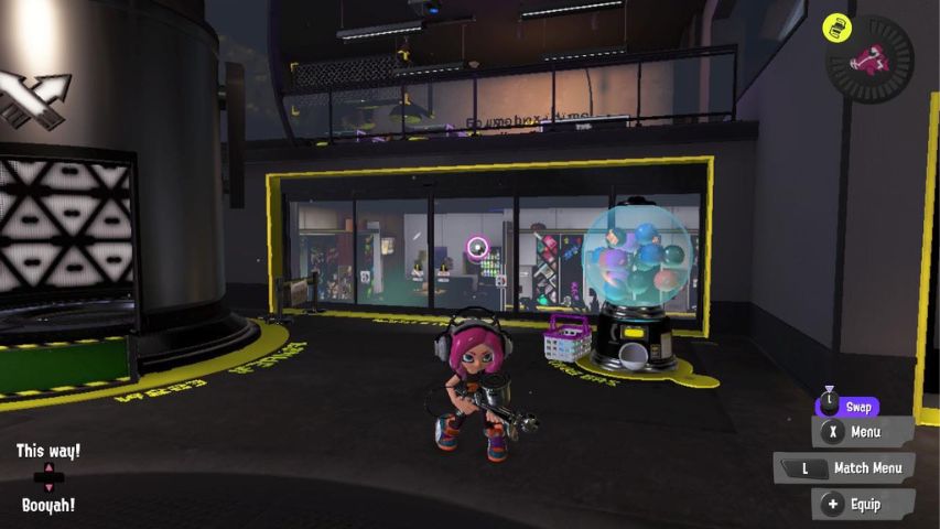 A character standing outside the entrance to the locker room in Splatoon 3