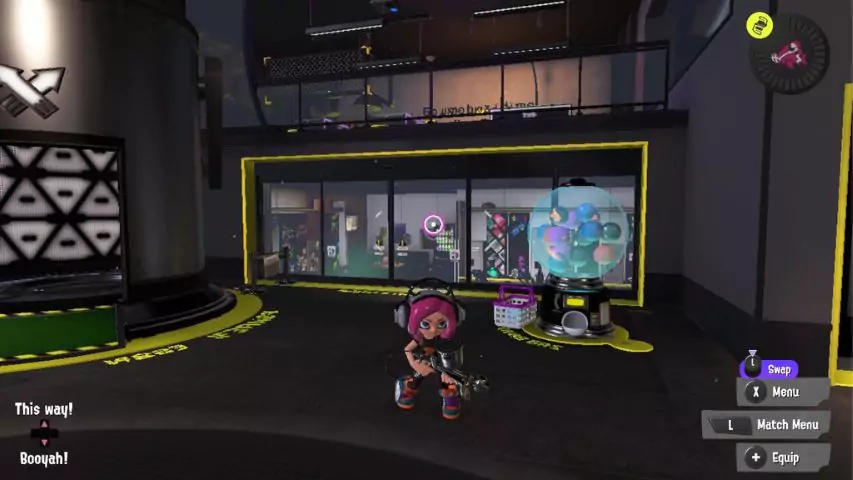 A character standing outside the entrance to the locker room in Splatoon 3