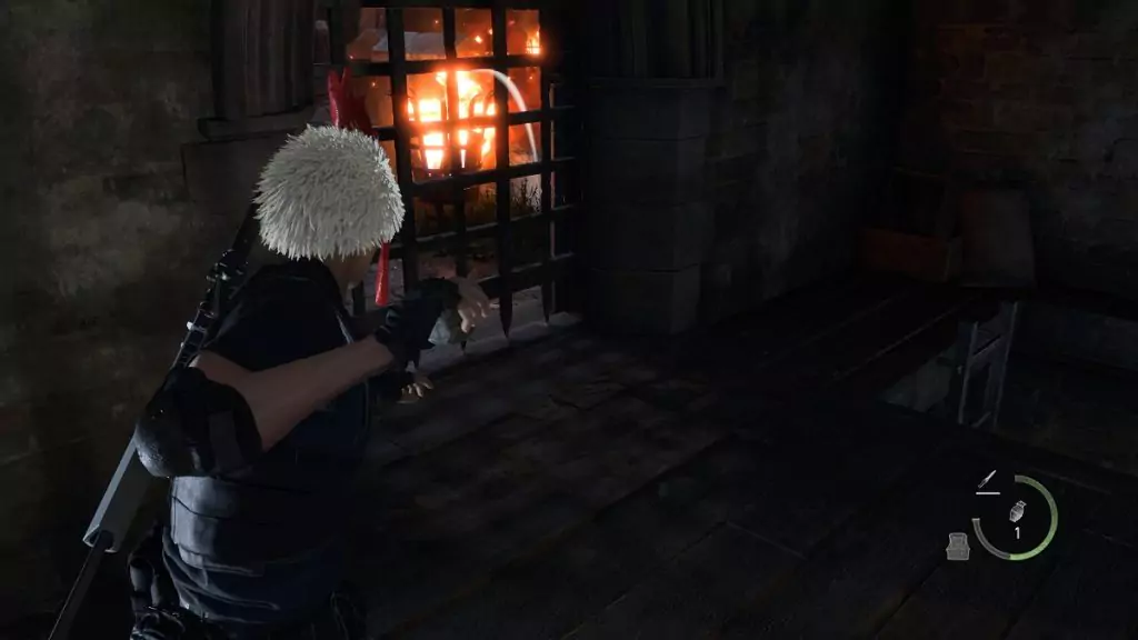 Throwing a grenade at the gate in the Castle Battlement in Resident Evil 4.
