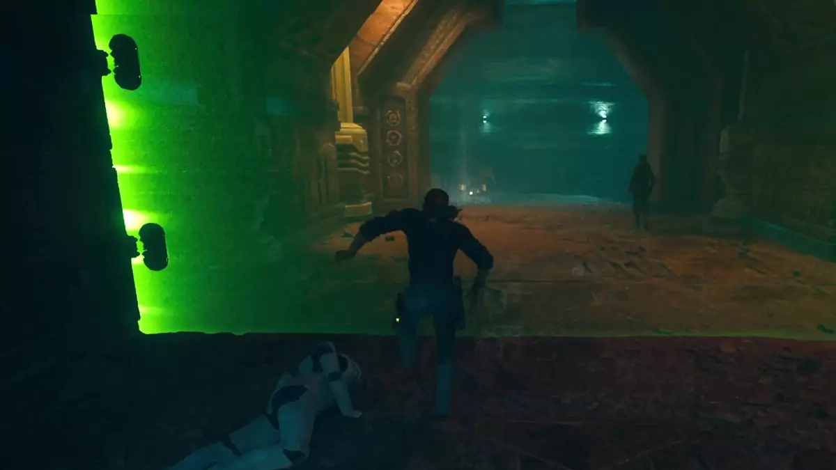Cal running toward a green barrier in Star Wars Jedi: Survivor.