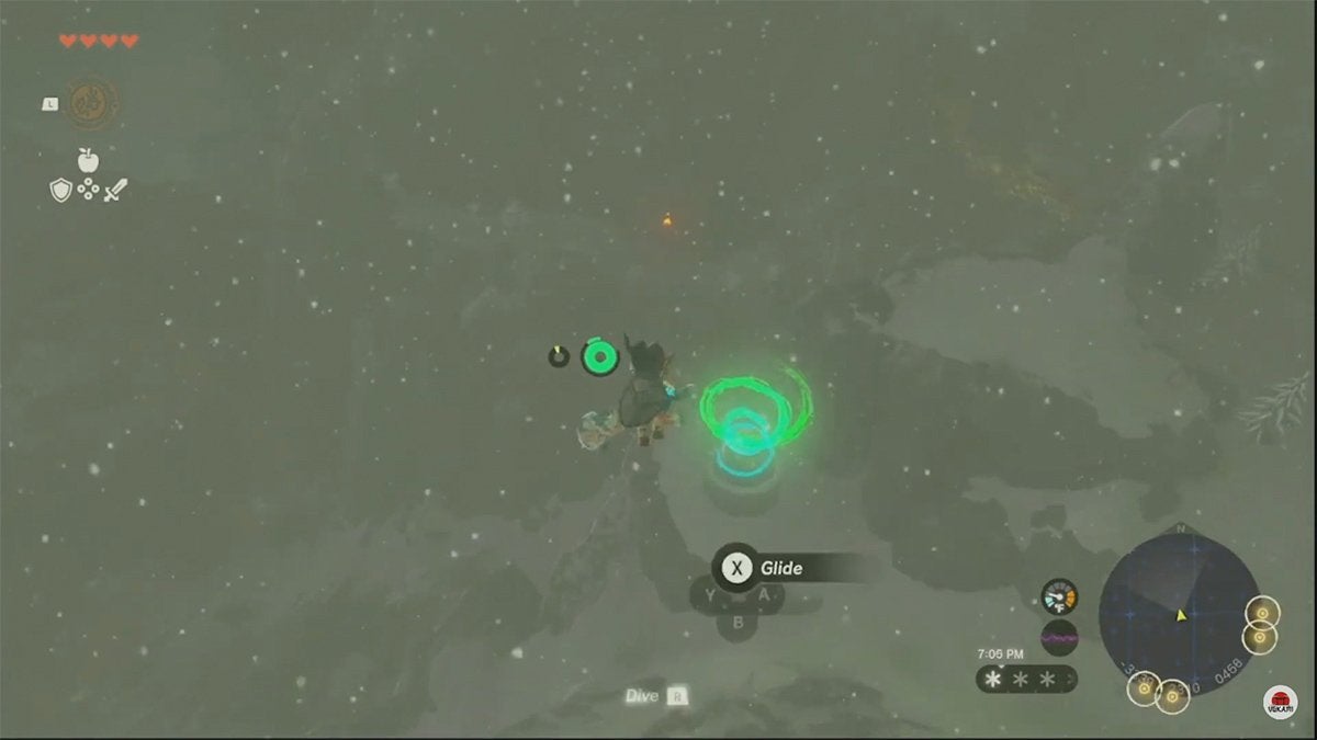 Link jumping down to a Shrine while it's snowing.