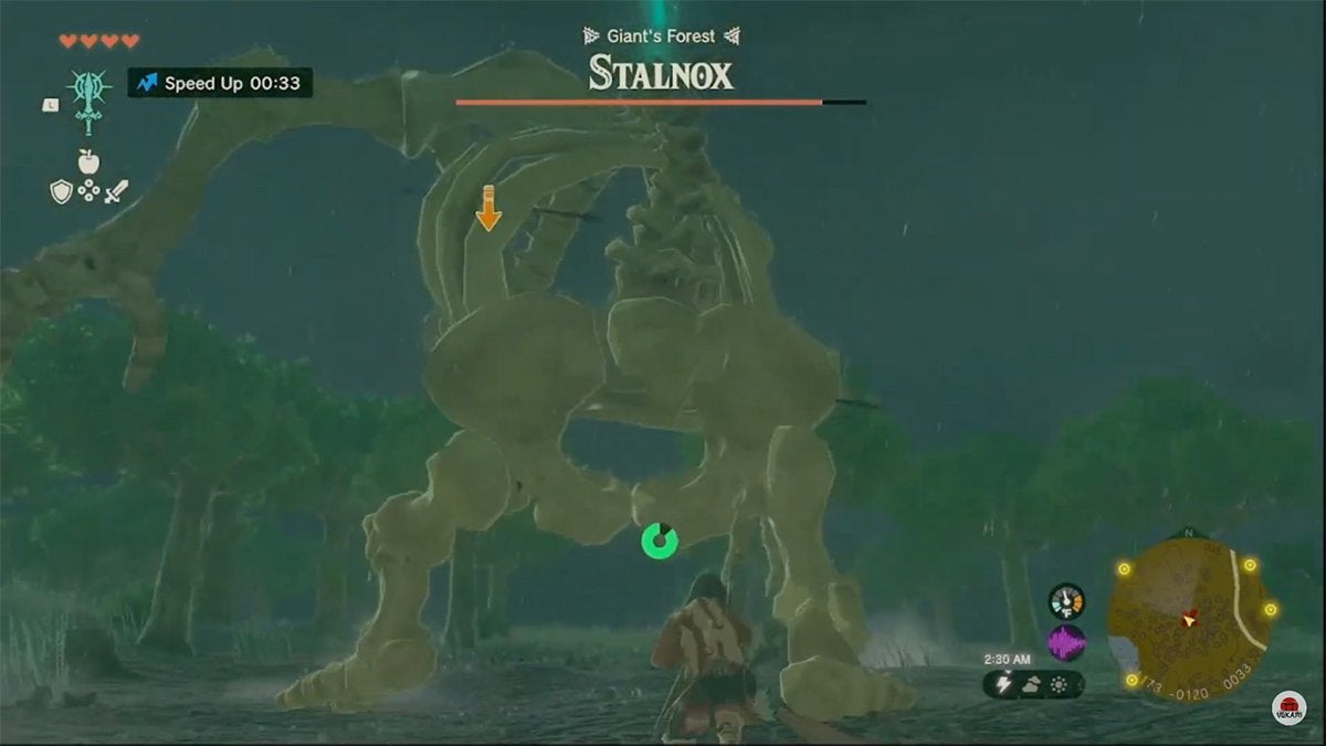 Link hitting Stalnox in the back.