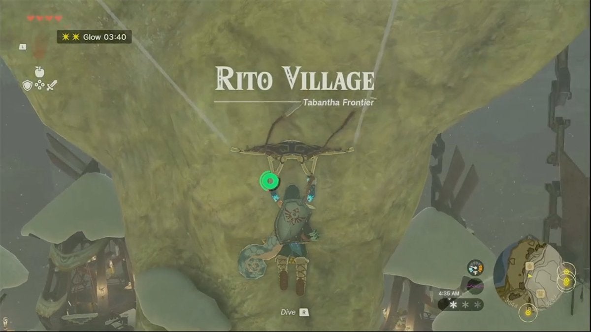 Link gliding into Rito Village as the village's title text appears.