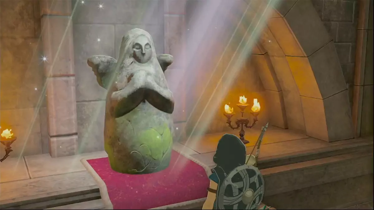 Link looking at the Goddess Statue under Lookout Landing in The Legend of Zelda: Tears of the Kingdom.