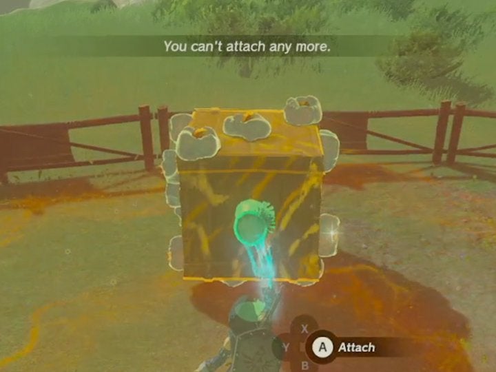 Link trying to attach a Bomb Flower to a box with Ultrahand in The Legend of Zelda: Tears of the Kingdom, but the game won't let him.