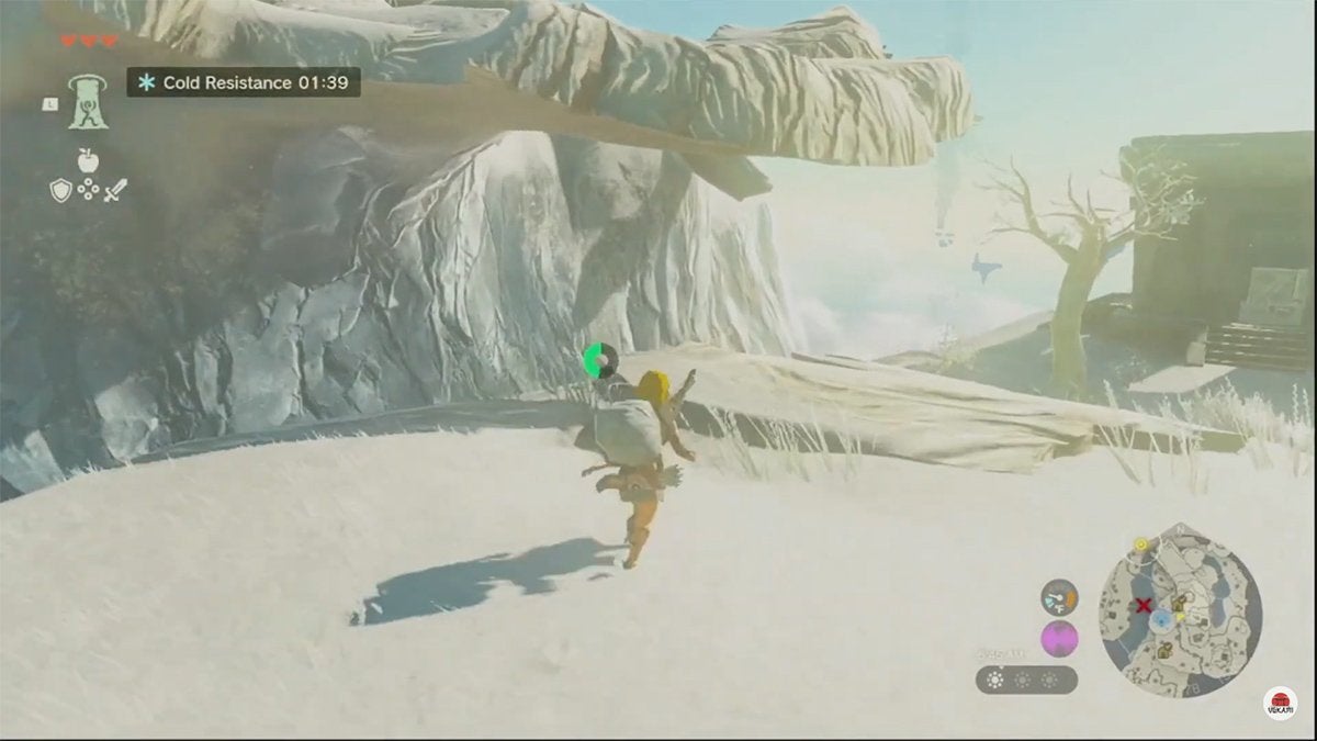 Link running towards a ledge overhanging from a higher area.