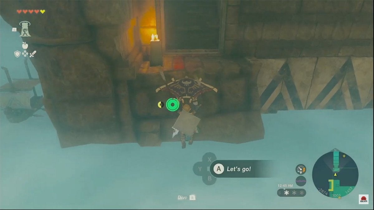 Link gliding across a gap in the floor to a stairway ahead of him.