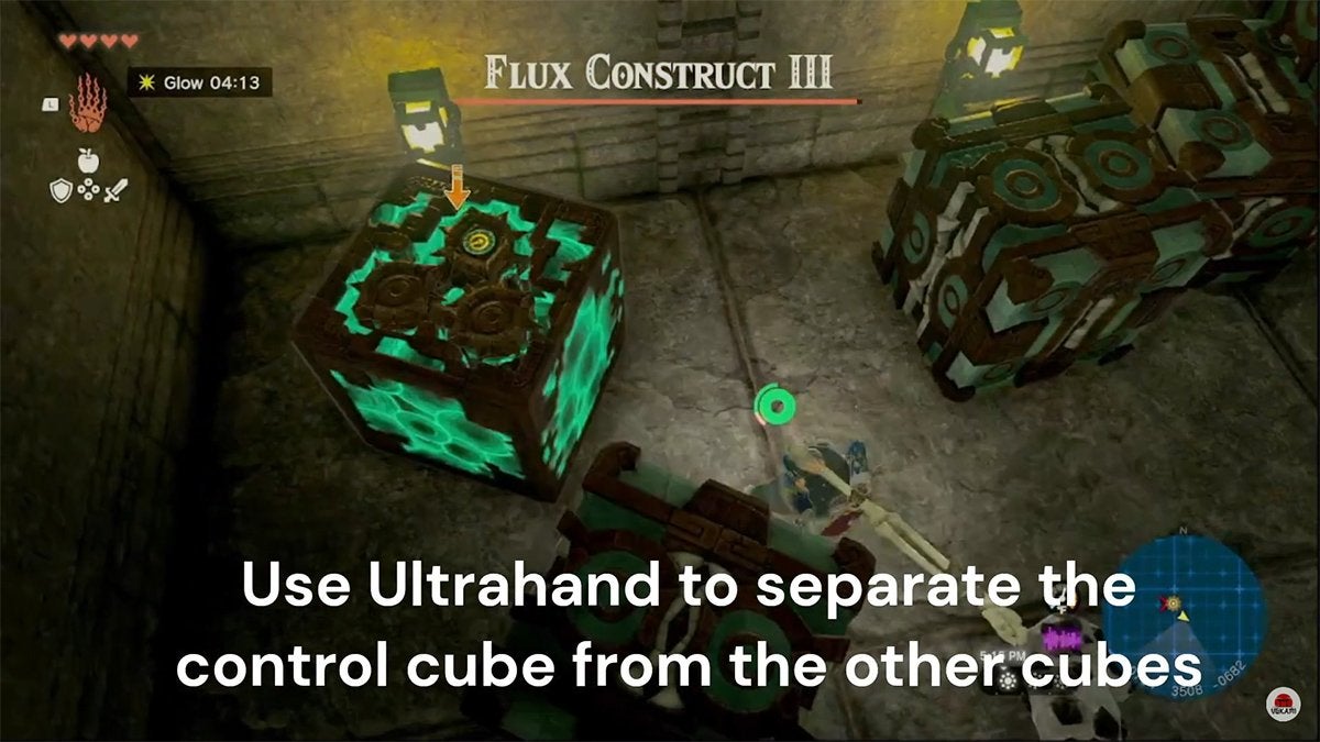 Link about to hit a glowing green cube while text mentions to use Ultrahand to separate this cube from the others.