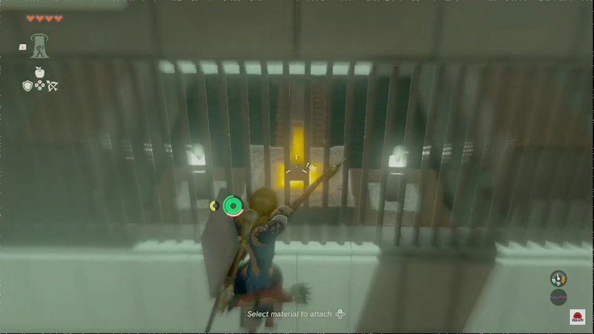 Link shooting through iron bars at a yellow inactive switch with a bow and arrow while in the air.