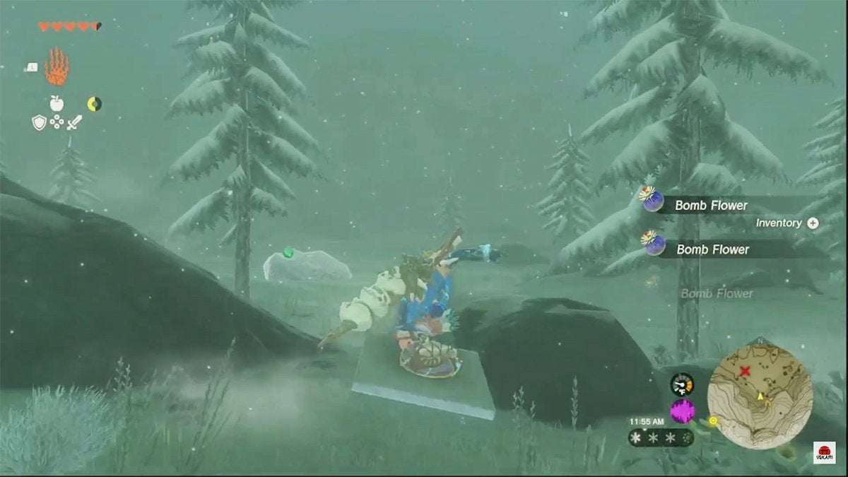 Link beginning to shield surf in a snowy area.