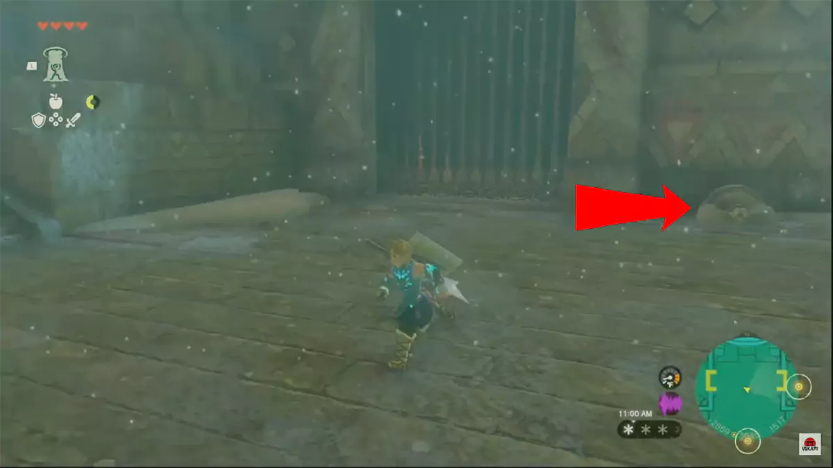 A red arrow pointing to a broken lever next to a gate.