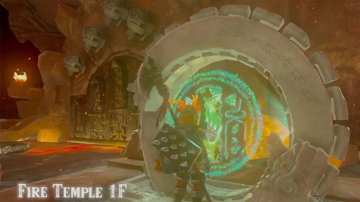 Link interacting with a circular statue in the Fire Temple in The Legend of Zelda: Tears of the Kingdom.
