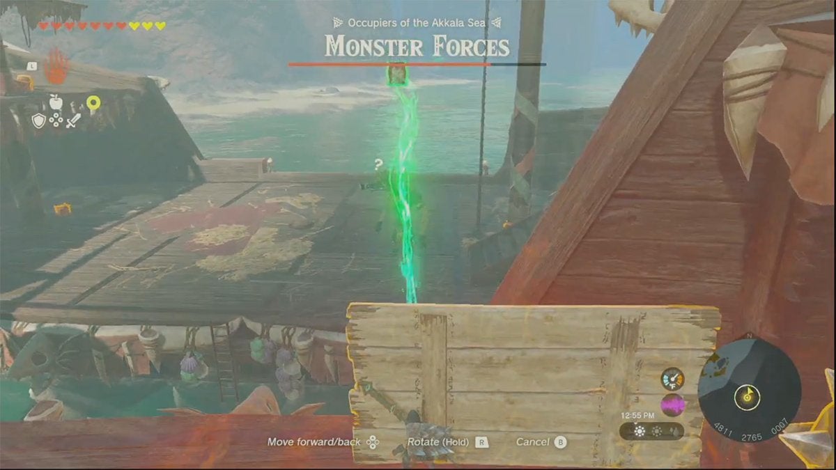 Link dropping an explosive barrel on a Black Moblin.