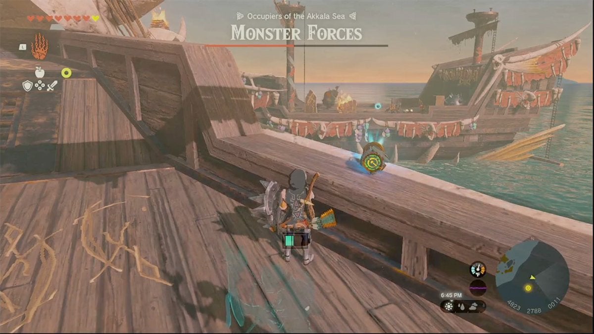 Link firing a cannon at a pirate ship.