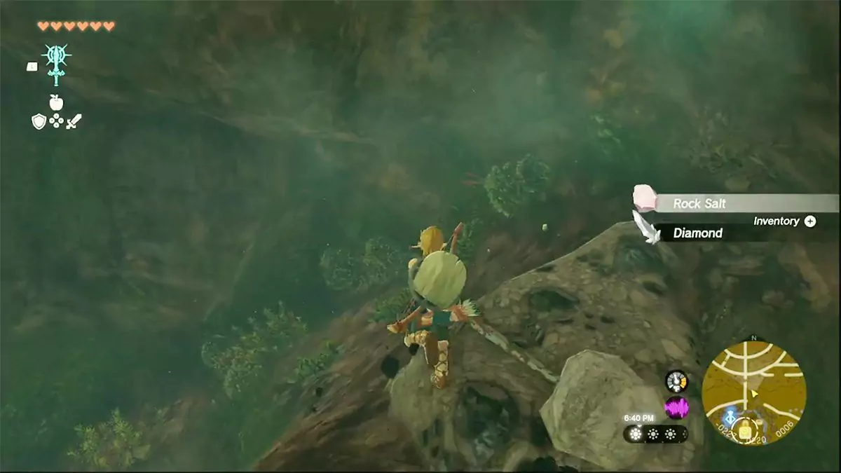 Link smashing an ore deposit and getting a Rock Salt and a Diamond.