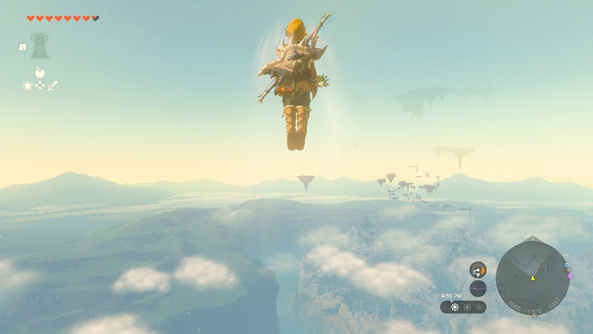 Link soaring into a clear blue sky in The Legend of Zelda: Tears of the Kingdom—an open world game.