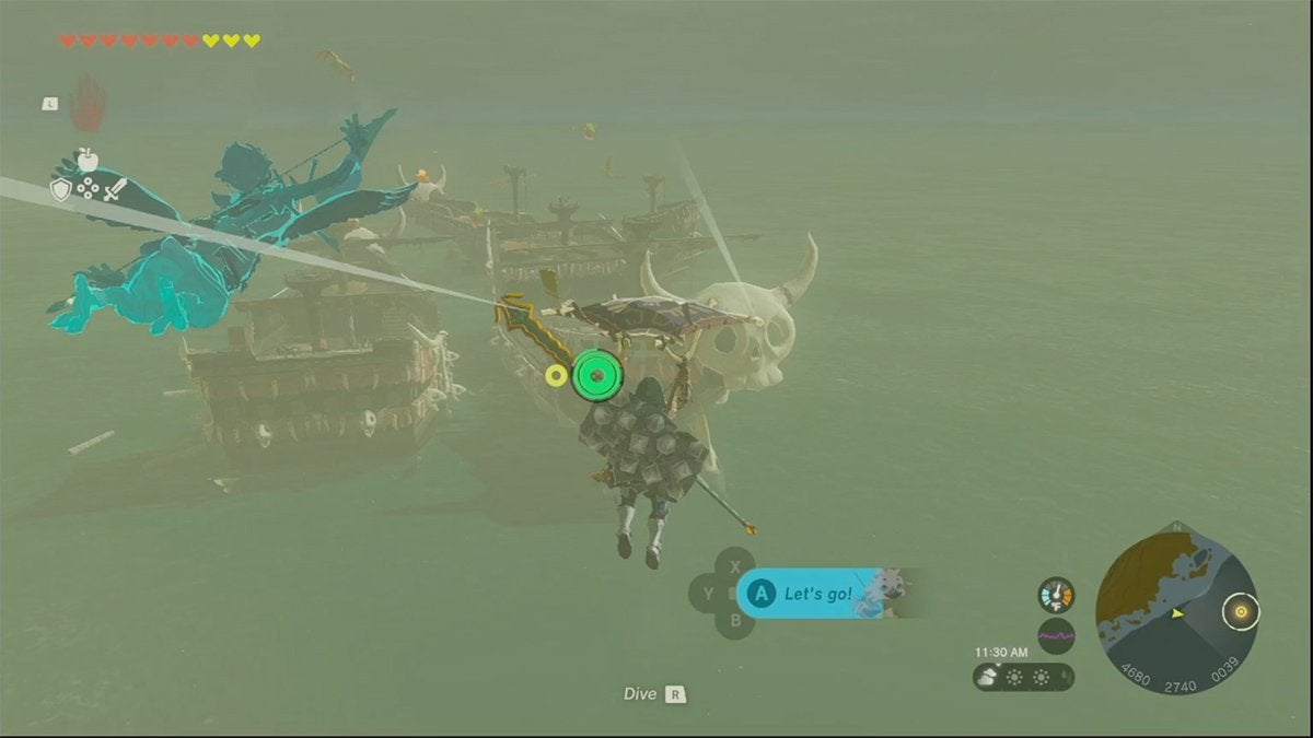 Link gliding towards some pirate ships adorned with huge horned skulls.