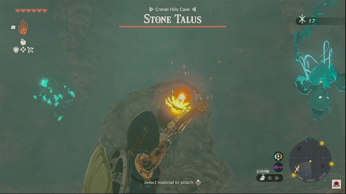 Link about to fire a Bomb Arrow at a Stone Talus in The Legend of Zelda: Tears of the Kingdom.