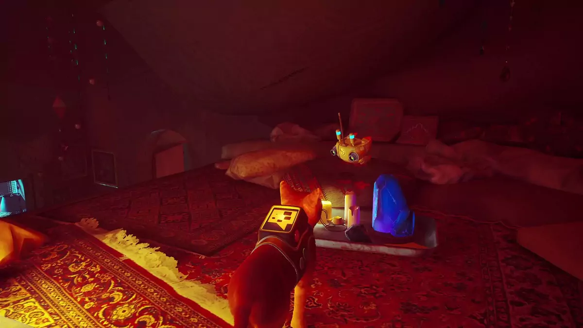 The Stray cat approaching a blue crystal in Clementine's apartment.