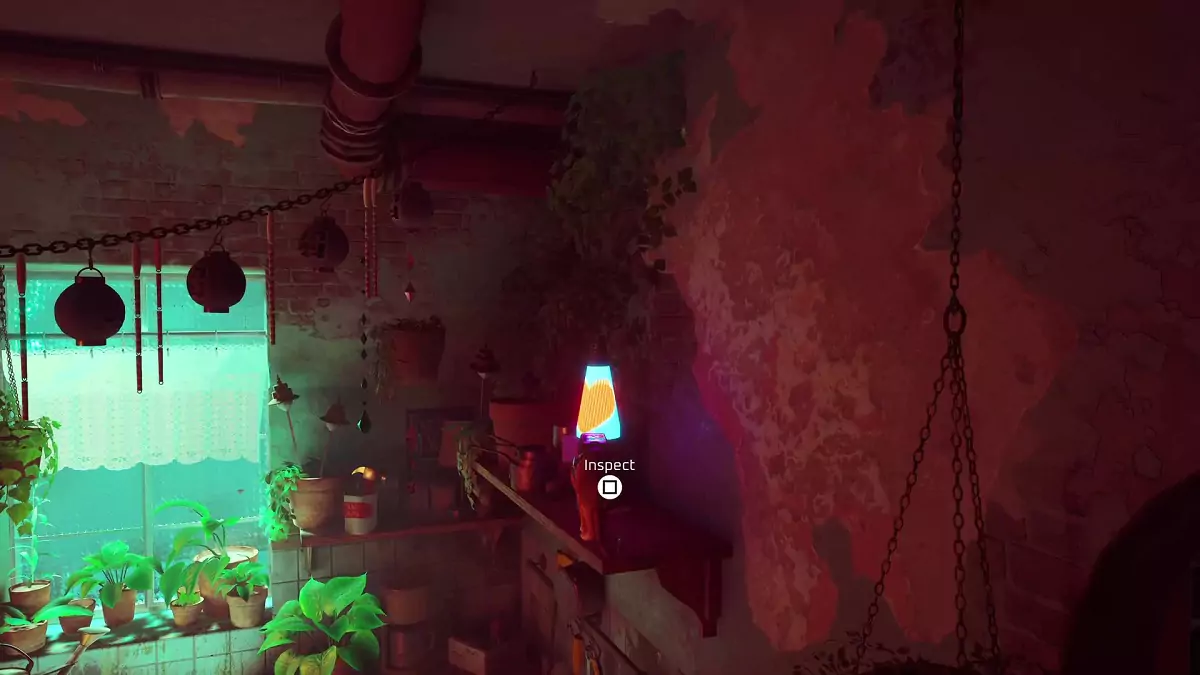The Stray cat next to a lava lamp in Clementine's apartment.