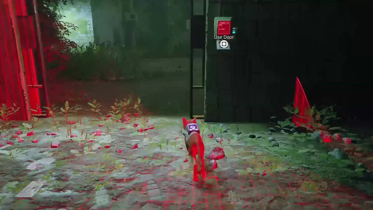 The Stray cat locking two more drones behind in a cell.