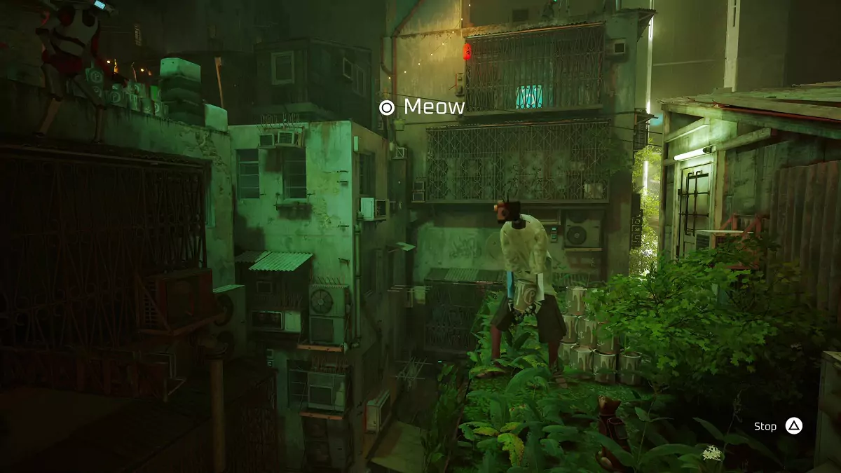Interrupting a robot while he throws a paint can in Stray.