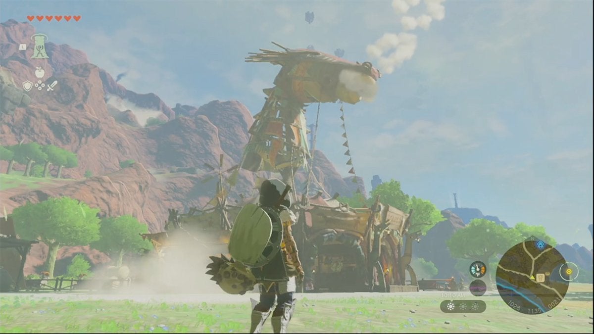 Link looking at the large horse-shaped roof of Woodland Stable.