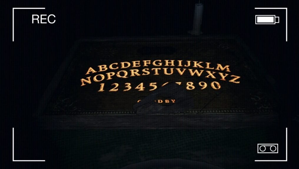 A Ouija Board on a table in the horror game Phasmophobia.