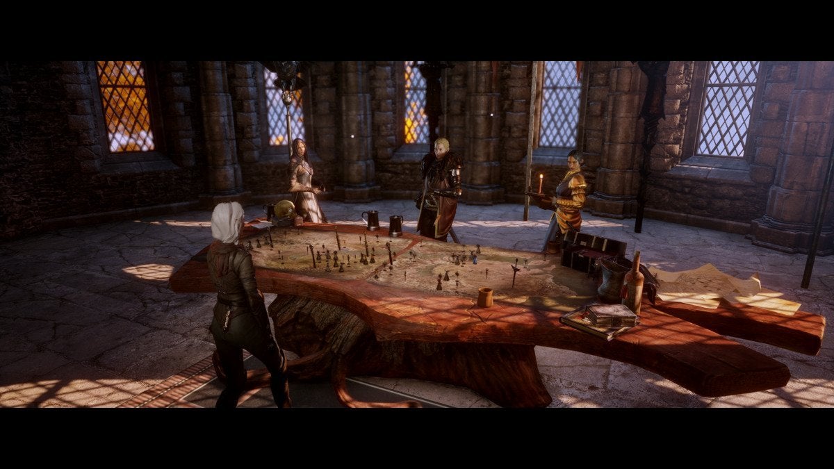 The Inquisitor meeting her advisors at the war table in Dragon Age: Inquisition.