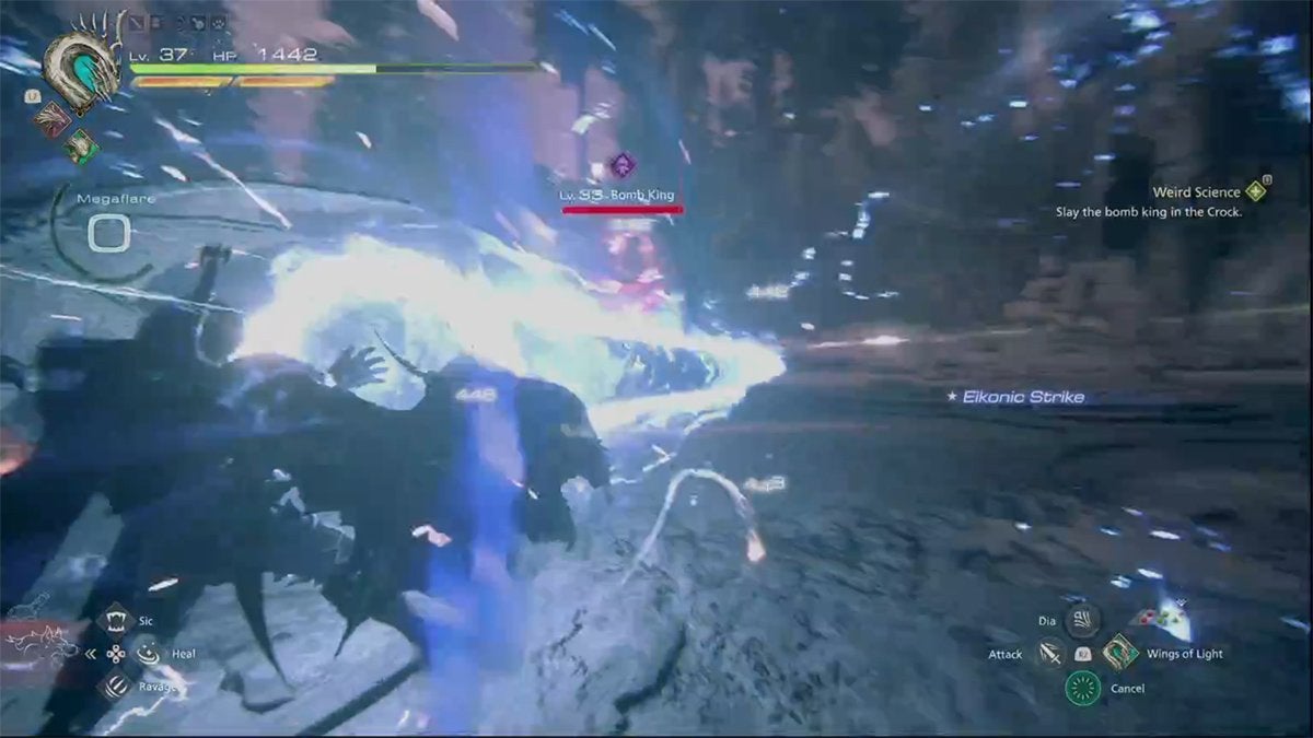 A player fighting the Bomb King in Final Fantasy 16. The player is using a large blue and white beam attack on the enemy.