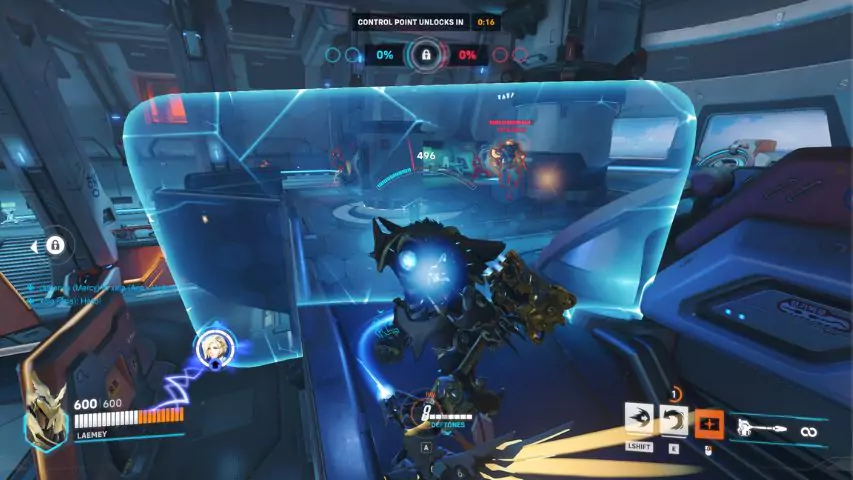 A Tank hero deploying a shield during an Overwatch 2 match.