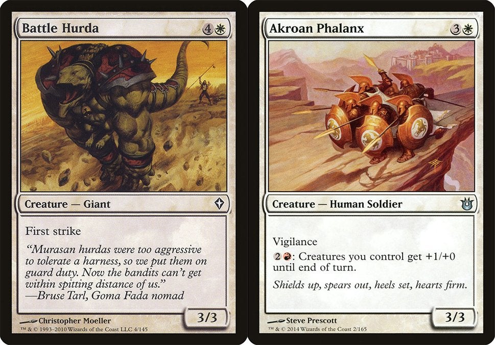 On the left is a white creature card with First Strike and on the right is a white creature card with Vigilance. Both are cards from Magic: The Gathering.